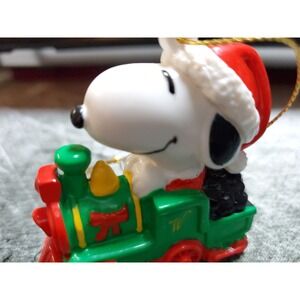 Vtg Snoopy Whitmans Christmas Ornament Green Train Engine Santa Hat Peanuts PVC